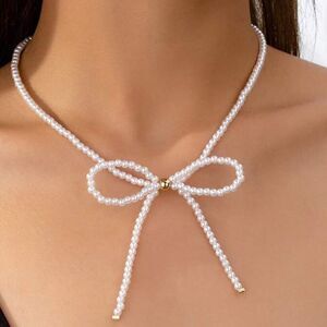 Free People White Pearl Bow Necklace with Gold Accents